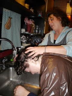 Jeannie rinsing out the dye from Jane's hair