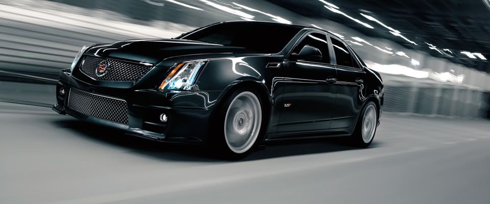 2011-cts-v-sedan-exterior-drivers-side-mm-gal-1-960x400-06.jpg