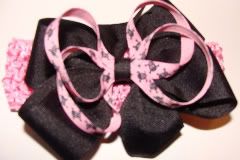 Pink and Black skully hairbow on headband!!