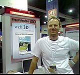 IGDatSiggraph07.jpg Johannes Behr in the Khronos Web3D spot image by web3d